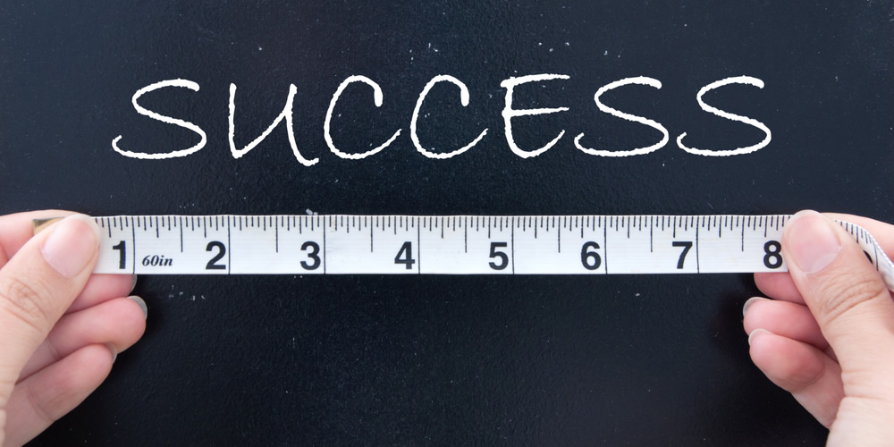 How do you measure student success?